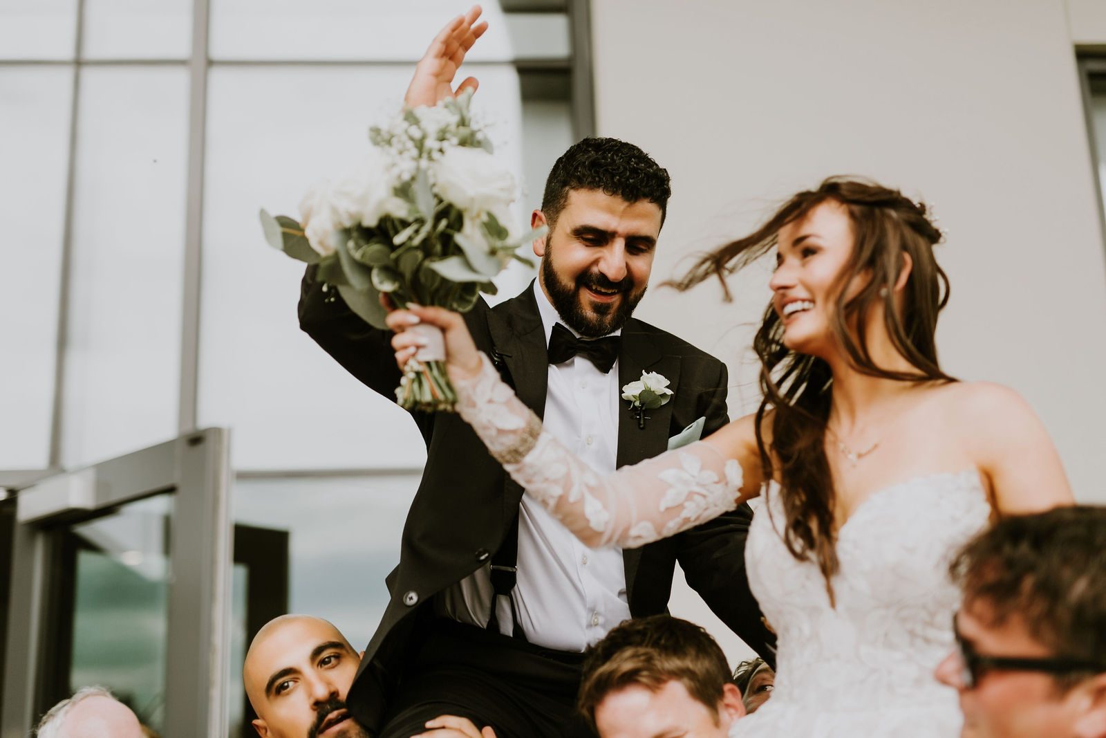Wedding guests celebrating outside the church after the ceremony