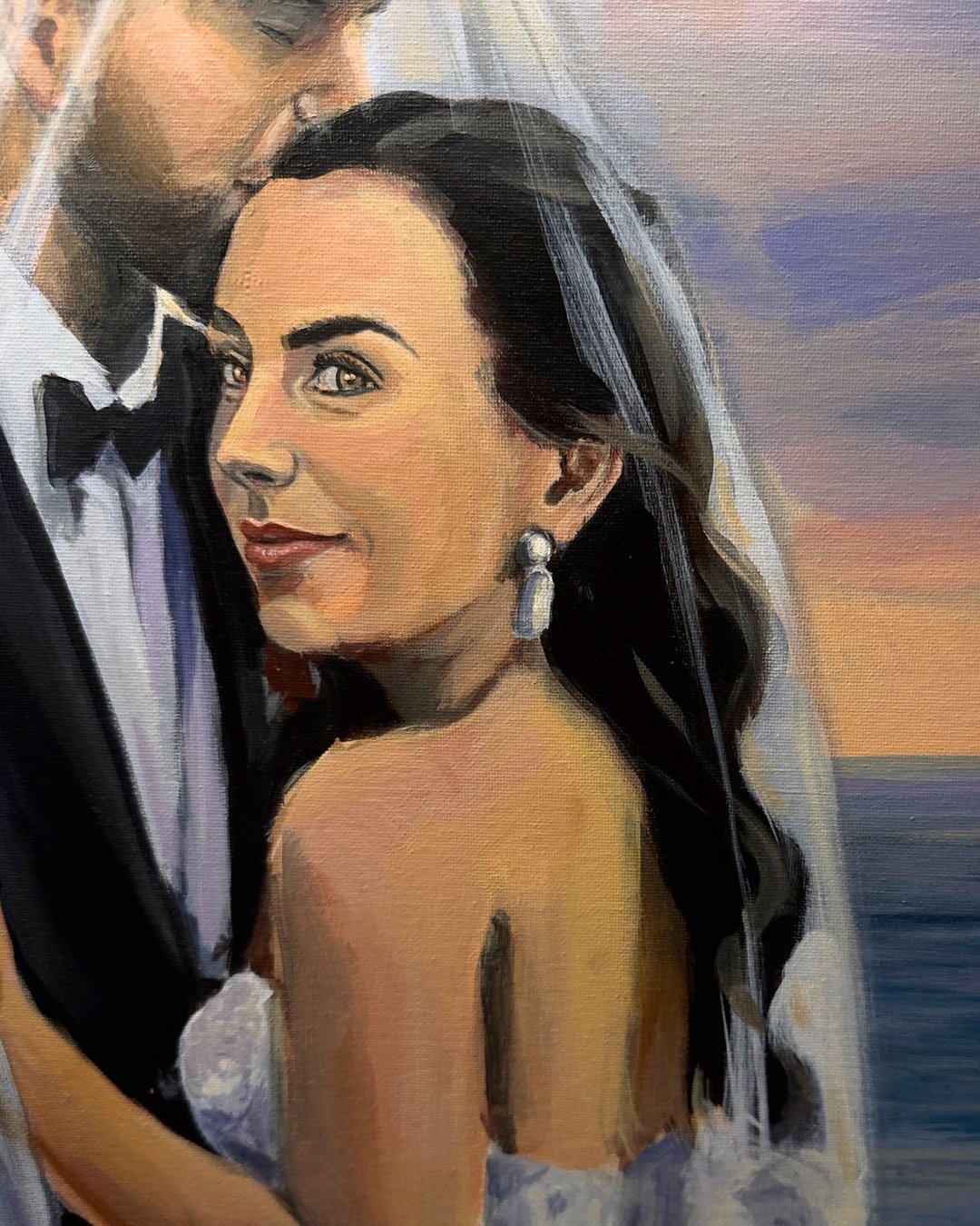 Detail from Only Want To Be With You — the bride's face turned up toward the groom, her veil lifting against the sunset sea
