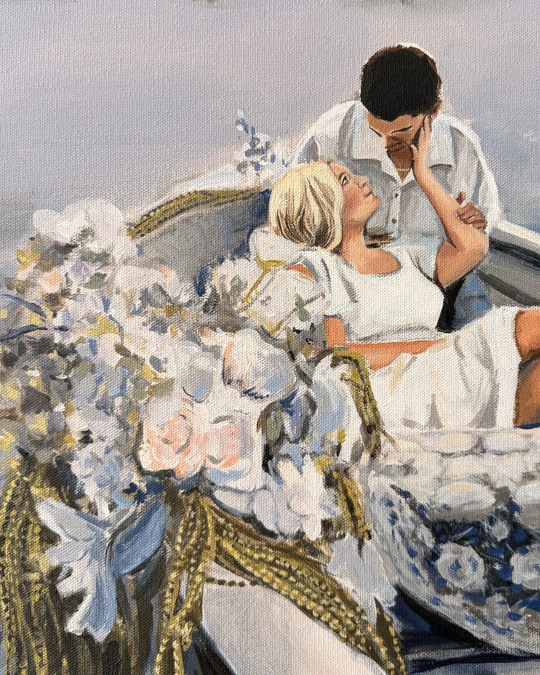 Detail from Away With You — the flower-covered bow of the boat, the couple leaning close behind it