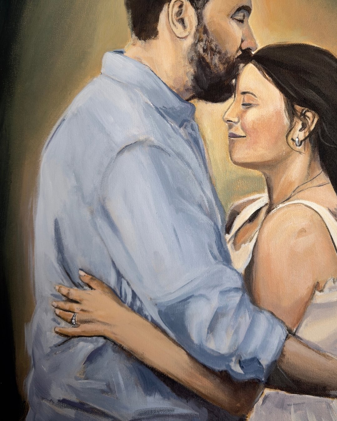 Detail from Where I Belong — her hand and engagement ring resting against his back as they embrace